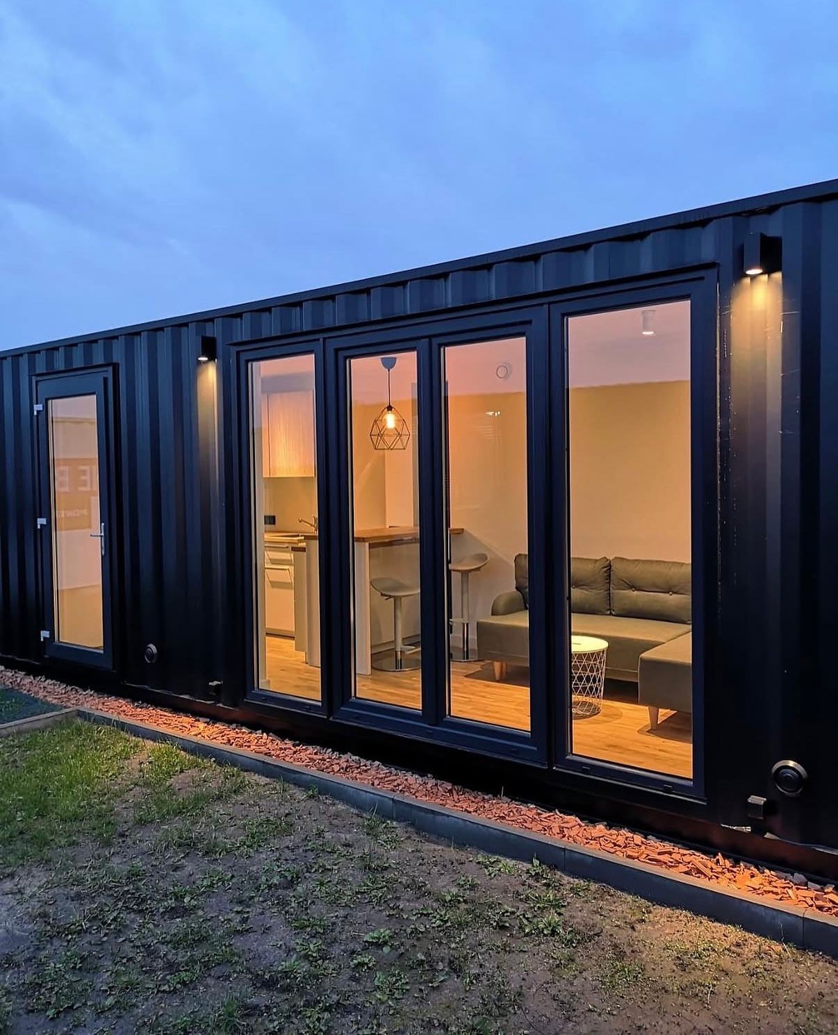 Container studio exterior night